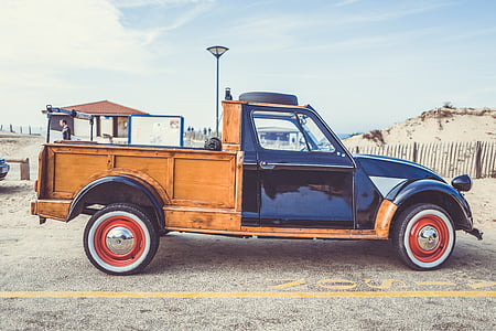 black and brown single cab pickup truck thumbnail