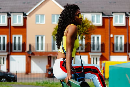 Woman Wearing Yellow Cami Crop-top thumbnail