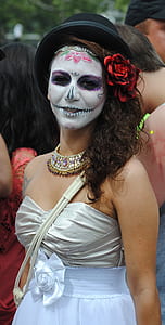 smiling woman with Halloween makeup thumbnail
