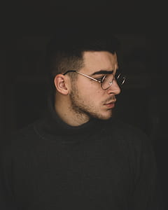 man wearing eyeglasses and black shirt thumbnail