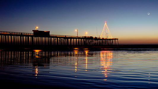 dock in ocean during golden hour thumbnail