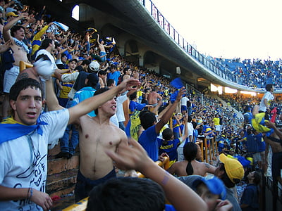 people gather in stadium thumbnail