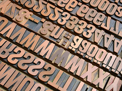closeup photography of brown alphabet thumbnail