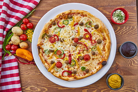 baked pizza served in plate thumbnail