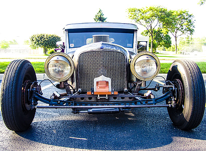 gray vintage car on asphalt road thumbnail