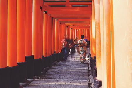 person walking on hallway during daytime thumbnail