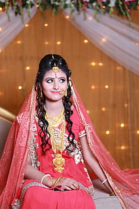 Woman in Pink and Beige Floral Traditional Dress thumbnail