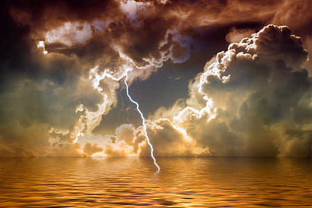 photo of lightning hitting body of water thumbnail
