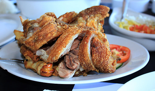 cooked meat on round white plate thumbnail