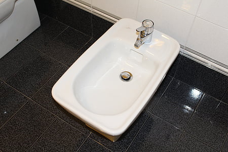 white bidet inside comfort room thumbnail