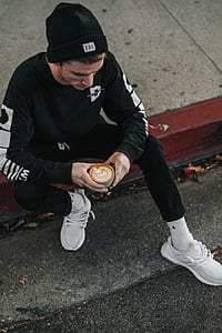 man holding cup of coffee thumbnail