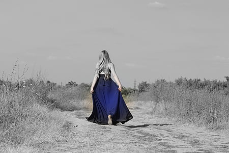 woman wearing blue and black sleeveless maxi dress thumbnail