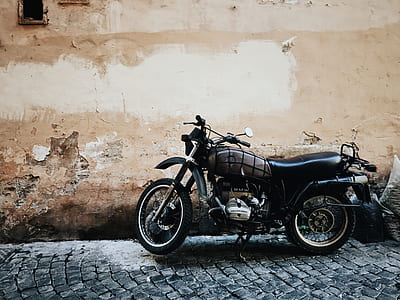 black standard motorcycle on road thumbnail