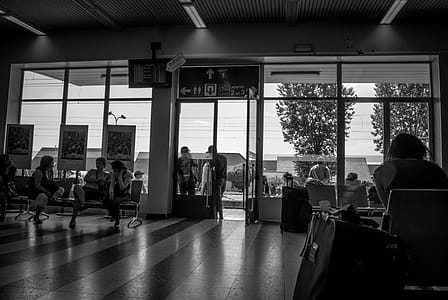 Group of People Indoors Grayscale Shot thumbnail