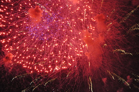 red fireworks during night time thumbnail