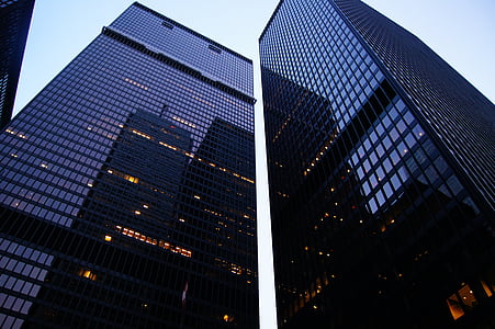 low-angle photography of curtain wall building during daytime thumbnail