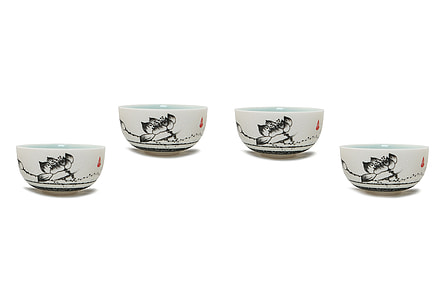 four white ceramic bowls illustration thumbnail
