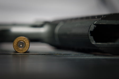 close-up photo of round brown bolt thumbnail