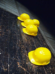 five yellow hard helmets thumbnail