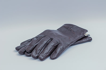 pair of black leather gloves thumbnail
