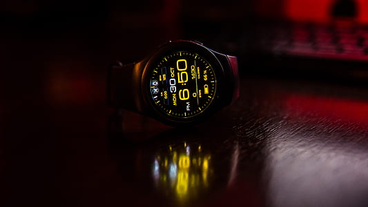 round black digital watch displaying 6:50 thumbnail