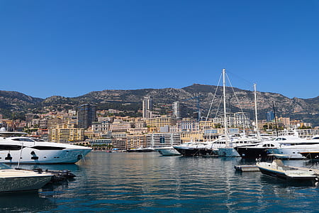 boats on body of water at daytime thumbnail