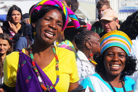 woman in yellow and purple top thumbnail