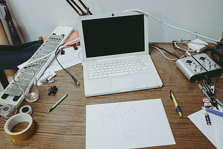 Old Macbook in artist’s studio thumbnail