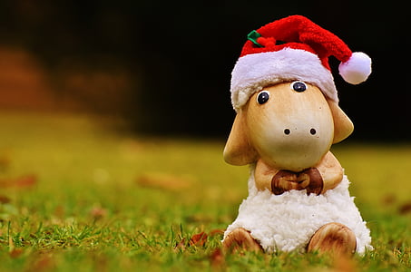 selective focus photography of brown ceramic sheep figurine thumbnail