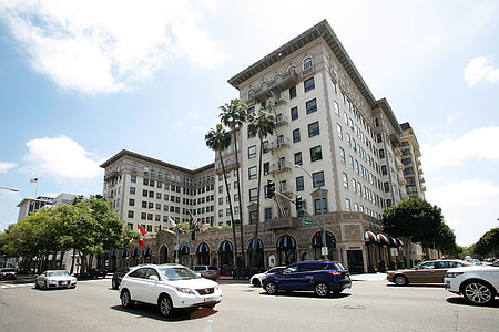 vehicles beside building thumbnail