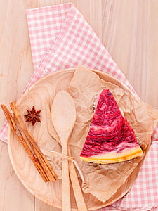 slice of cake with spatulas on plate thumbnail