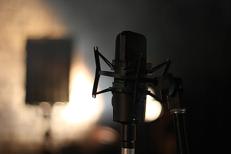 selective focus photography of condenser microphone thumbnail