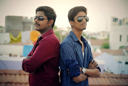 shallow focus photography of two men thumbnail