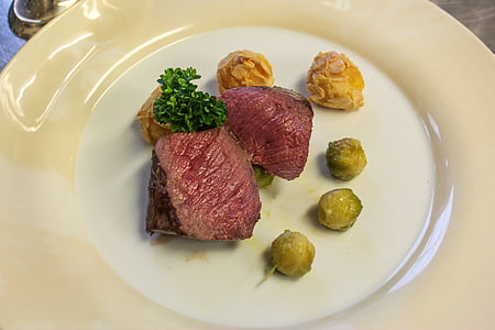 grilled meat on white ceramic plate thumbnail