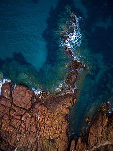 high-angle photography of cliff covered with water thumbnail