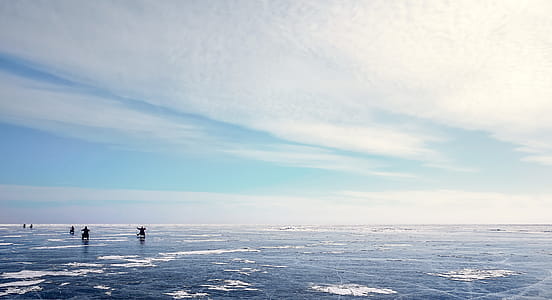 Photo of Five People on Ice Field thumbnail