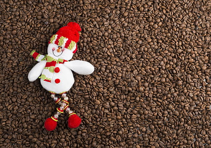 snowman ornament on coffee beans thumbnail