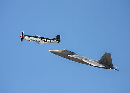 2 Jet Planes Flying Under Blue Sky thumbnail