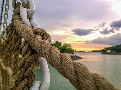 brown rope and white metal chain thumbnail