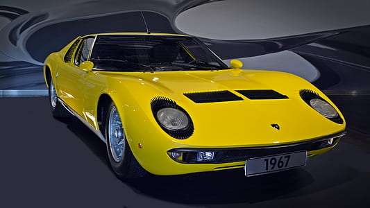 1967 yellow Lamborghini Miura coupe thumbnail