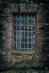 window on bricked house thumbnail