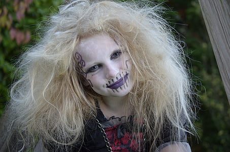 smiling girl wearing halloween costume thumbnail