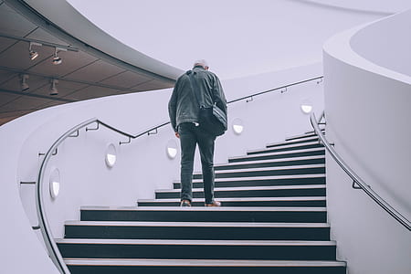 man standing on stair thumbnail