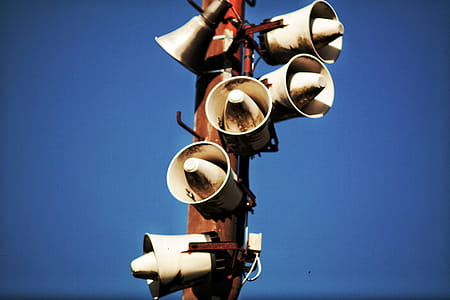 Megaphone Speakers on Wooden Post thumbnail