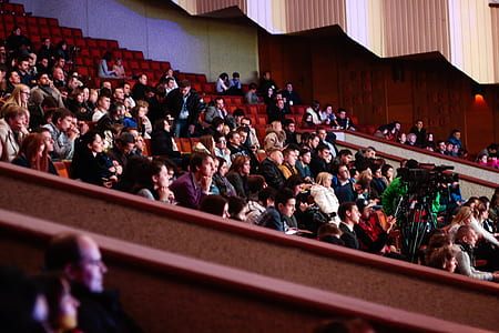 People Sitting Watching In The Theater thumbnail