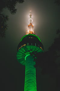 low-angle photography of lighthouse thumbnail