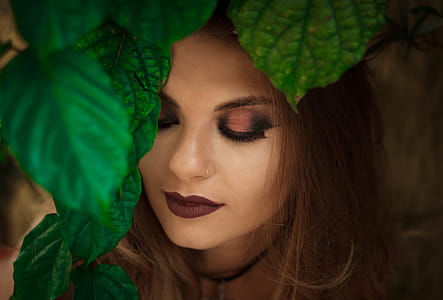 Shallow Focus Photography of Woman Near Leafy Tree thumbnail