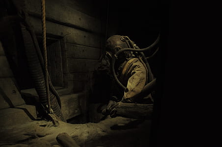 person wearing underwater suit in dark place thumbnail