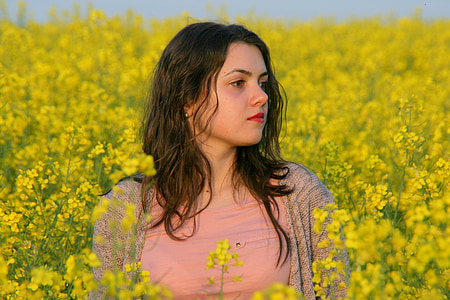 woman in pink top on green grass field thumbnail