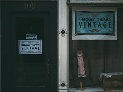 white and black Ghost Town Vintage sign thumbnail